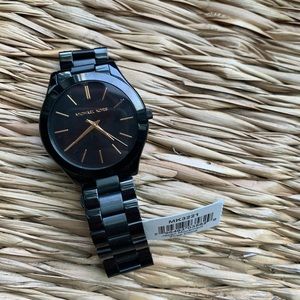 Black and gold Michael kors watch